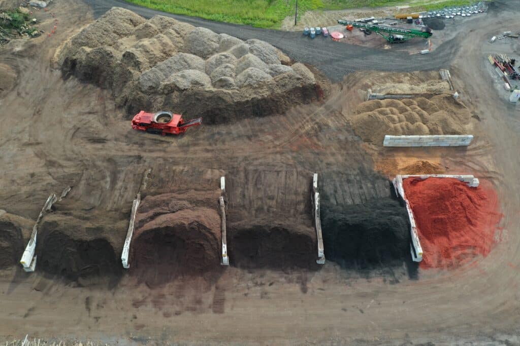 Arial view of Central Tree's mulch bins displaying red, black, dark brown, chocolate, and other mulch